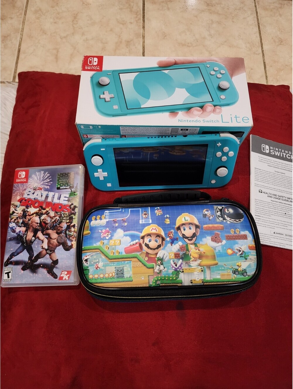 Nintendo Switch Lite Turquoise + Carrying Case, Clear Case & W2k Battle Grounds